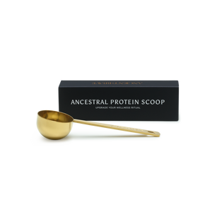 Gold protein scoop with 'Ancestral Protein Scoop' packaging on a white background