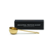 Gold protein scoop with 'Ancestral Protein Scoop' packaging on a white background