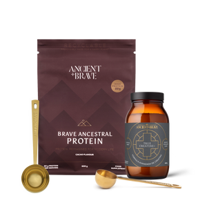 Brave Ancestral Protein packaging with a jar of True Creatine+ and two Ritual Scoops on a blank background