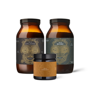 Three amber glass supplement containers from Ancient + Brave: two large bottles labeled True Collagen and True Biome, and one smaller jar labeled True Omegas+ with a tan label and black lid.